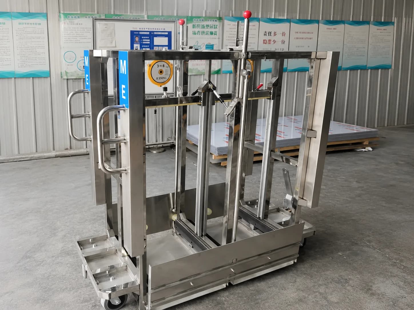 Towing transfer train trolley in a workshop application with visible towing and coupling structure