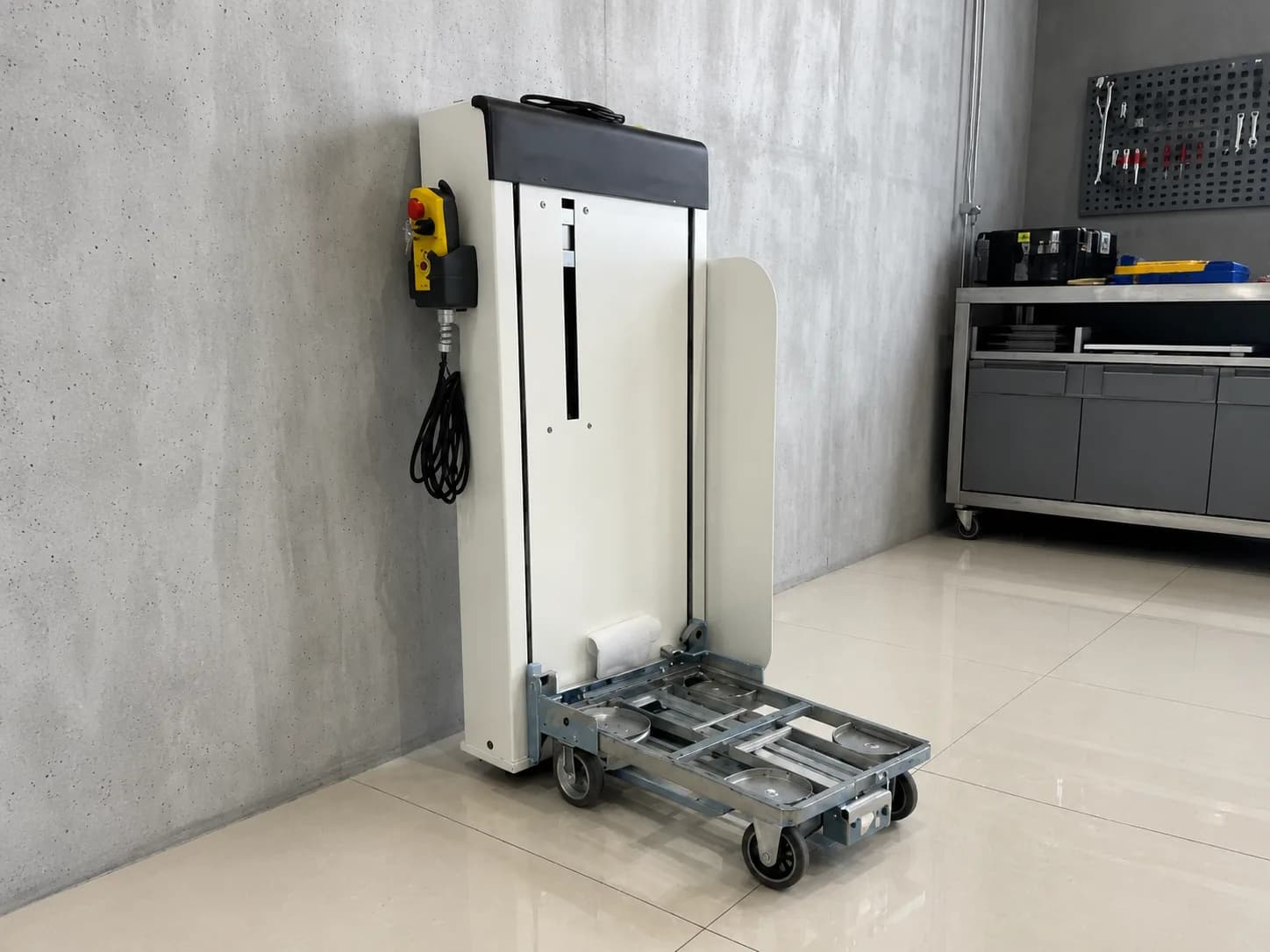 Vertical pallet lift configured with a wheeled trolley and customized carrier interface